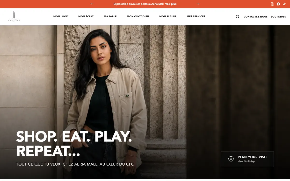 Aeria Mall home page: large photograph, the Shop. Eat. Play. Repeat. headline and a Plan your visit button.